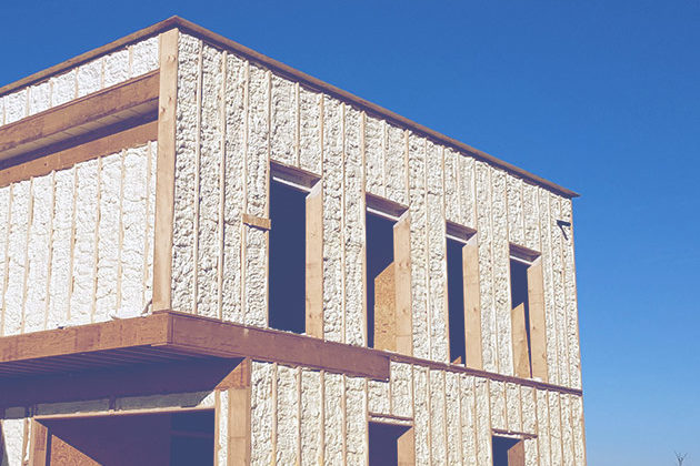 Isolation des murs extérieurs d'un bâtiment en bois - ISEO Projection