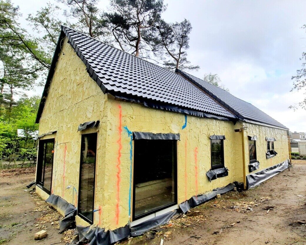 solation des murs extérieurs d’une cour à Olen
