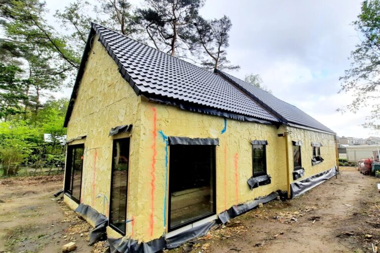solation des murs extérieurs d’une cour à Olen