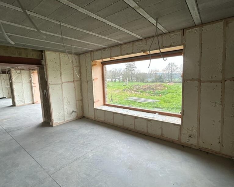 Isolation par l'intérieur des murs d'une fermette à Ernonheid