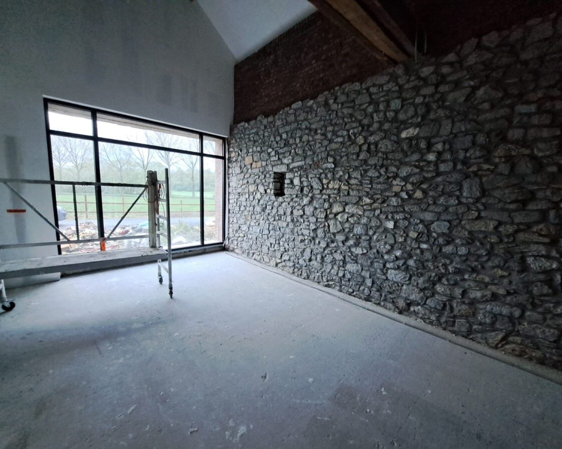 Isolation d'une ancienne fermette par le sol dans le Hainaut