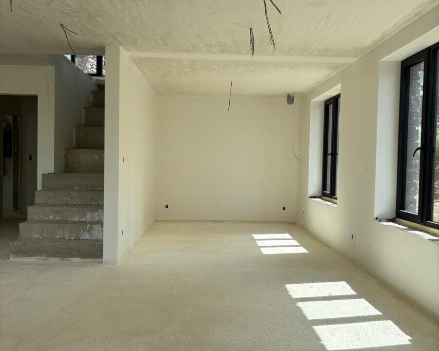 Living isolé par le sol avec de la mousse projetée à Braibant