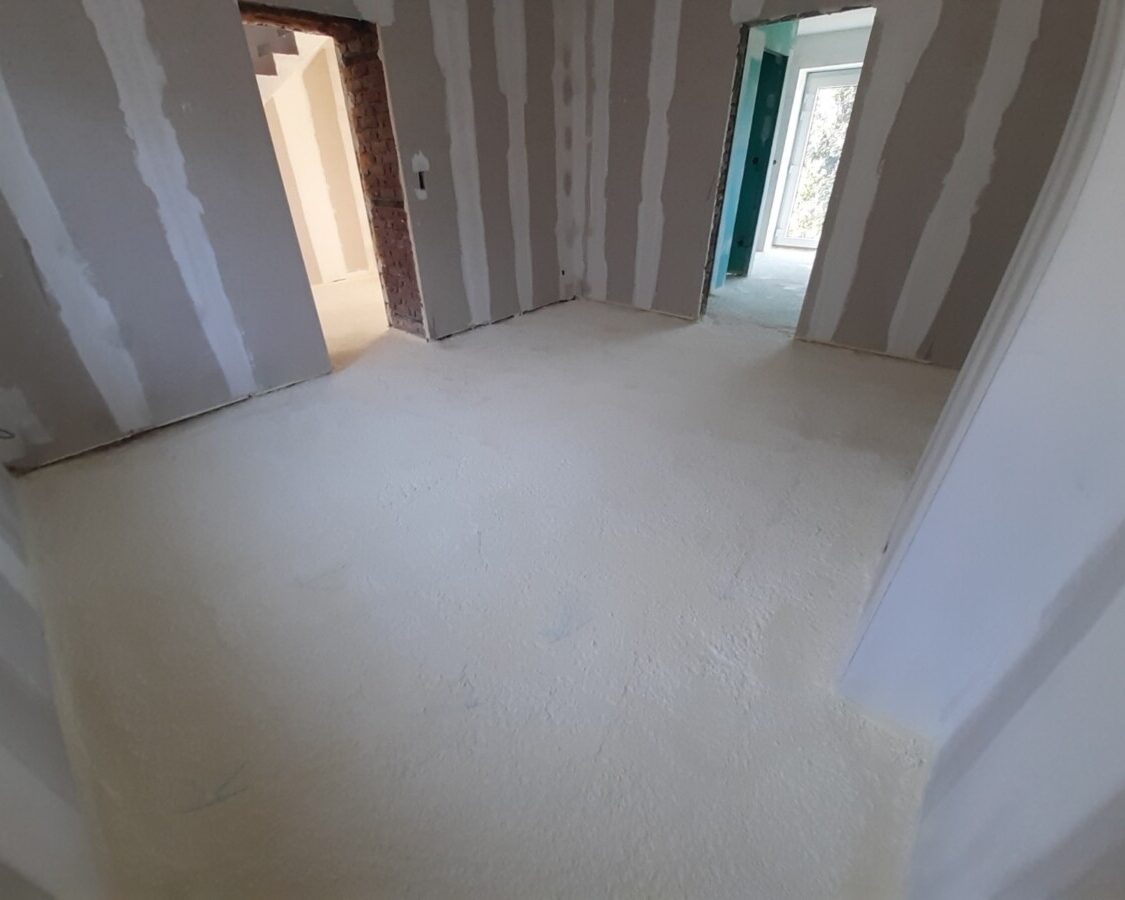 Isolation des sols d'une maison rénovée à Couvin